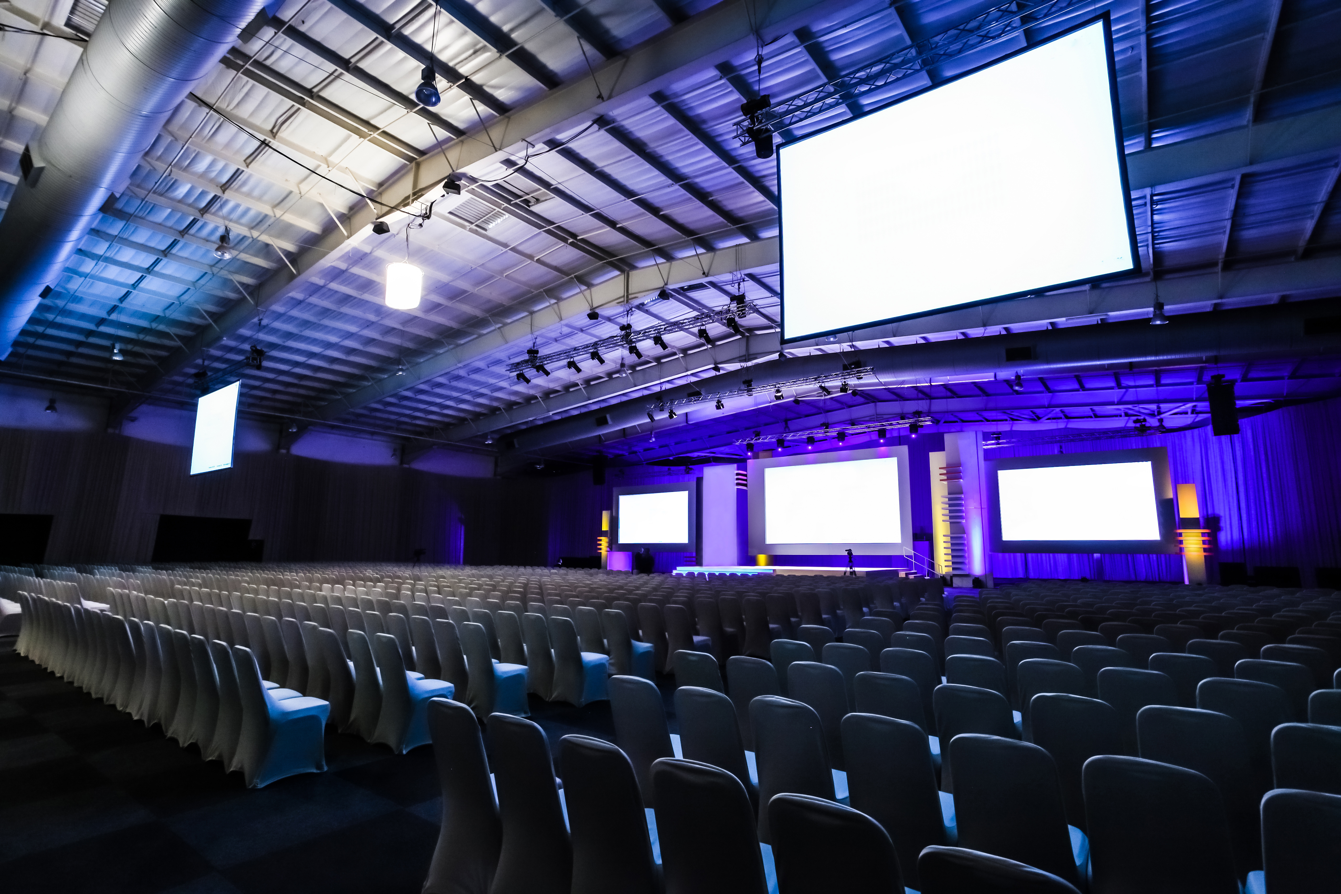 Rows of empty chairs in large Conference hall for Corporate Convention or Lecture