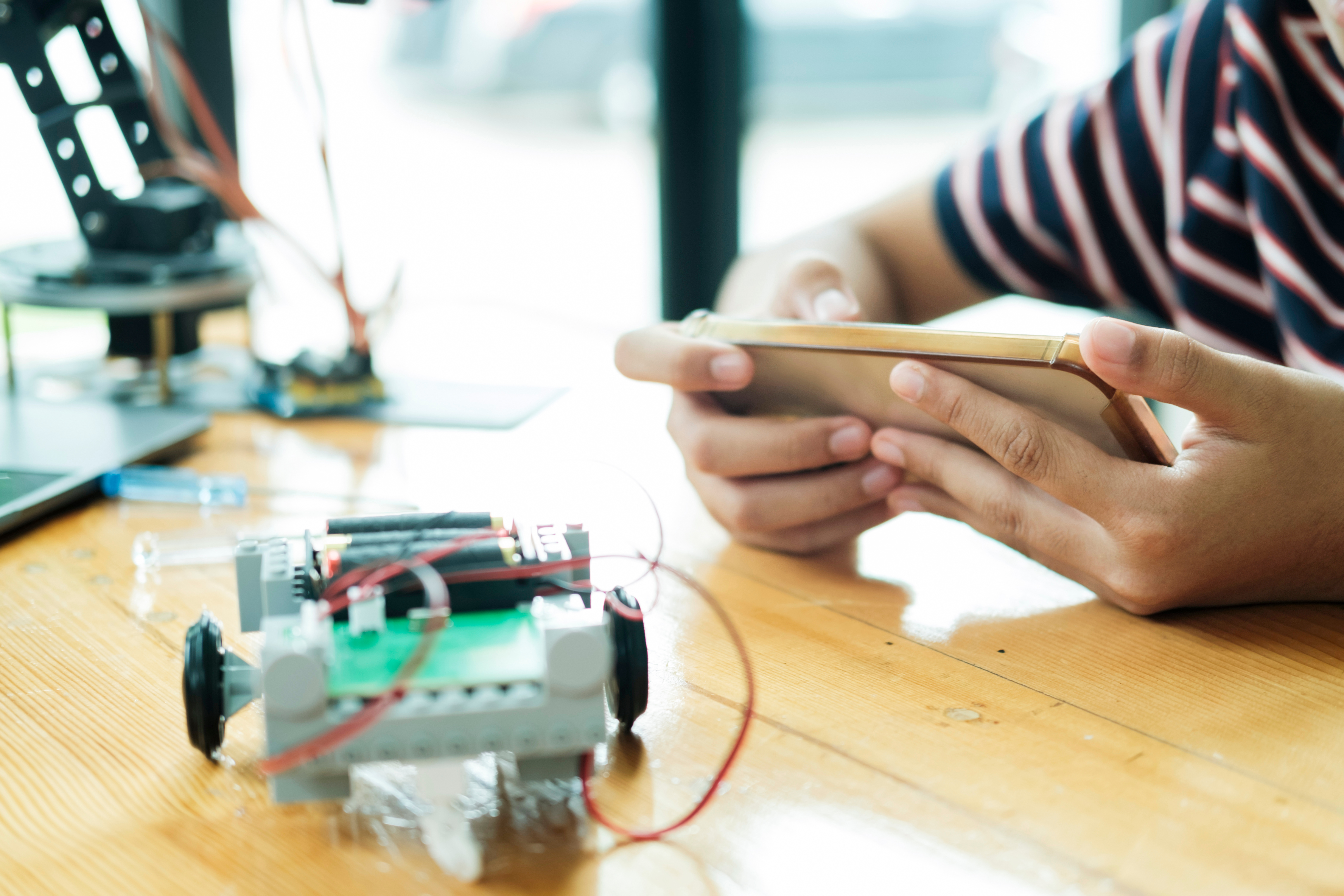 Student learning STEM Education robotics for creating project-based studying for innovation robot models New study generation for DIY electronic kits in mathematics engineering science technology computer code in computer technology classroom